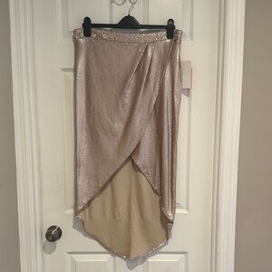 Little Mistress Asymmetrical Sequin Skirt in Pink Champagne